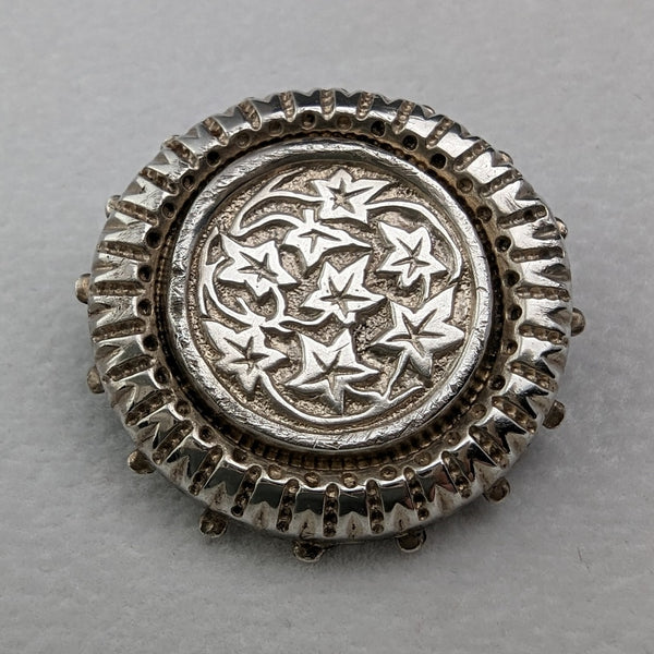 Vintage silver leaf engraved round brooch
